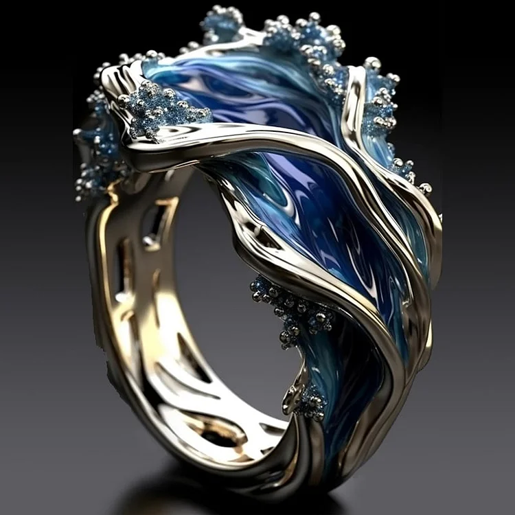 Bague vintage en or au motif de vagues marines