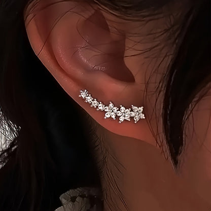Des boucles d'oreilles fleuries intemporelles