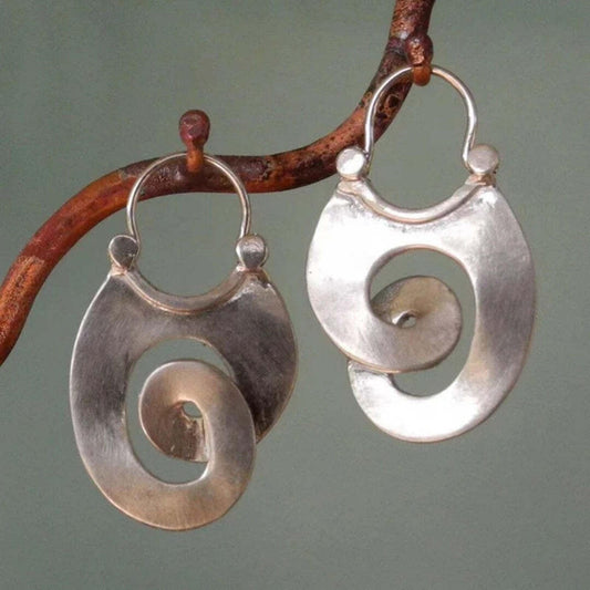 Boucles d'oreilles rétro en argent aux formes irrégulières