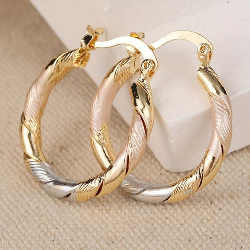 Boucles d'oreilles vintage rondes en or, argent et rose