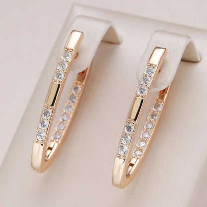 Élégantes boucles d'oreilles en zirconium et or
