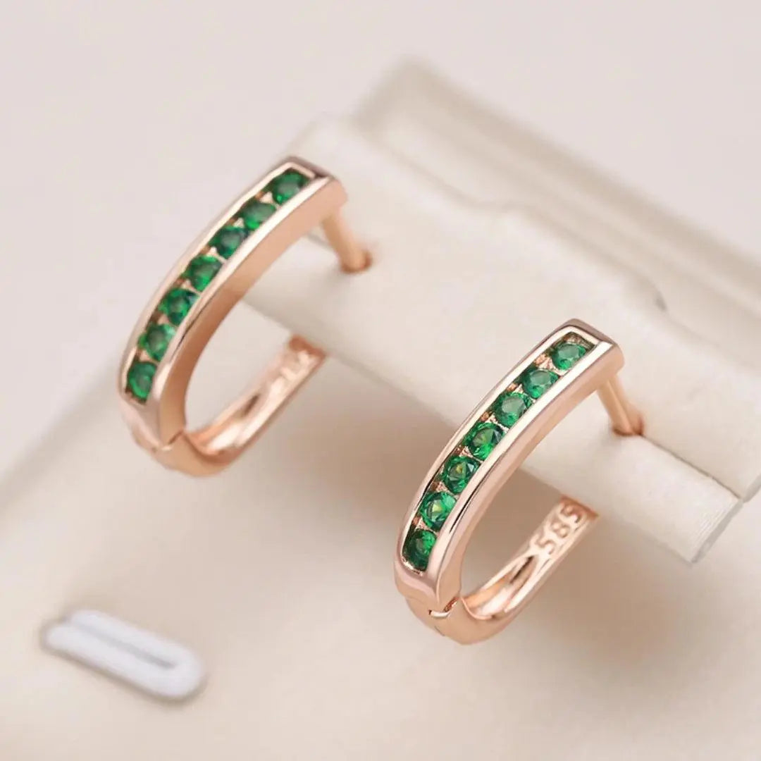 Boucles d'oreilles en or avec diamant émeraude