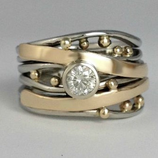 Bague en Or et Argent Ornée d’un Zircon