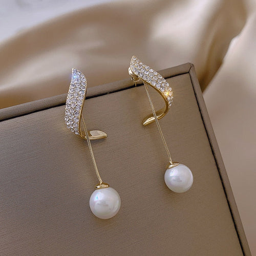 Boucles d'oreilles pendantes en argent 925 avec perles et zircons étincelants