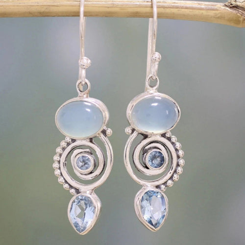 Boucles d'oreilles vintage en argent ornées de pierre de lune