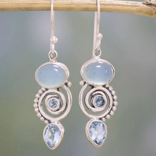 Boucles d'oreilles vintage en argent ornées de pierre de lune