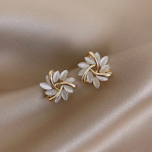 Boucles d’Oreilles Raffinées en Or et Argent Style Clous