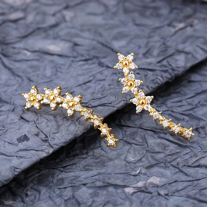 Des boucles d'oreilles fleuries intemporelles