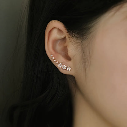Des boucles d'oreilles fleuries intemporelles