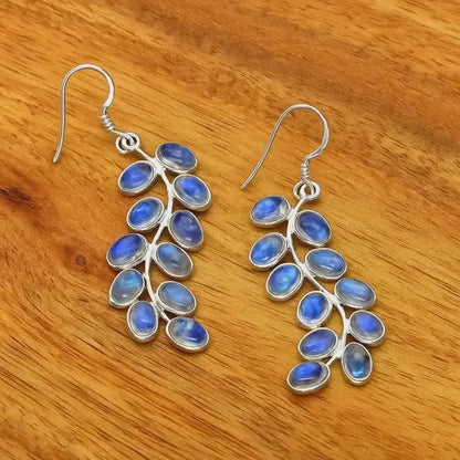 Élégantes boucles d'oreilles en pierre de lune violette