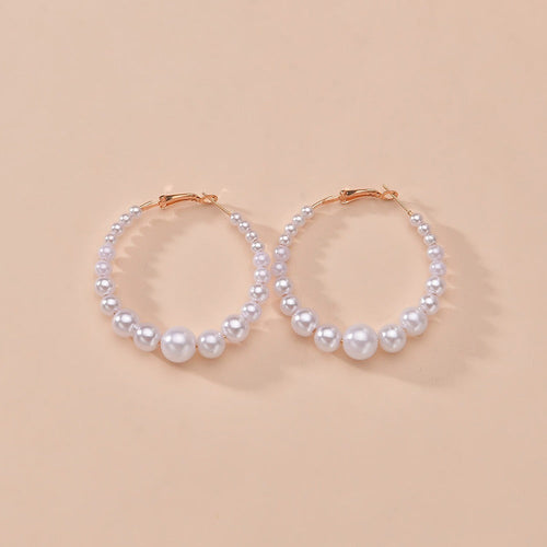 Boucles d'oreilles en argent massif faites à la main avec des perles d'eau douce naturelles