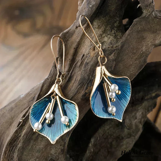Boucles d'oreilles en or et bleu avec des perles